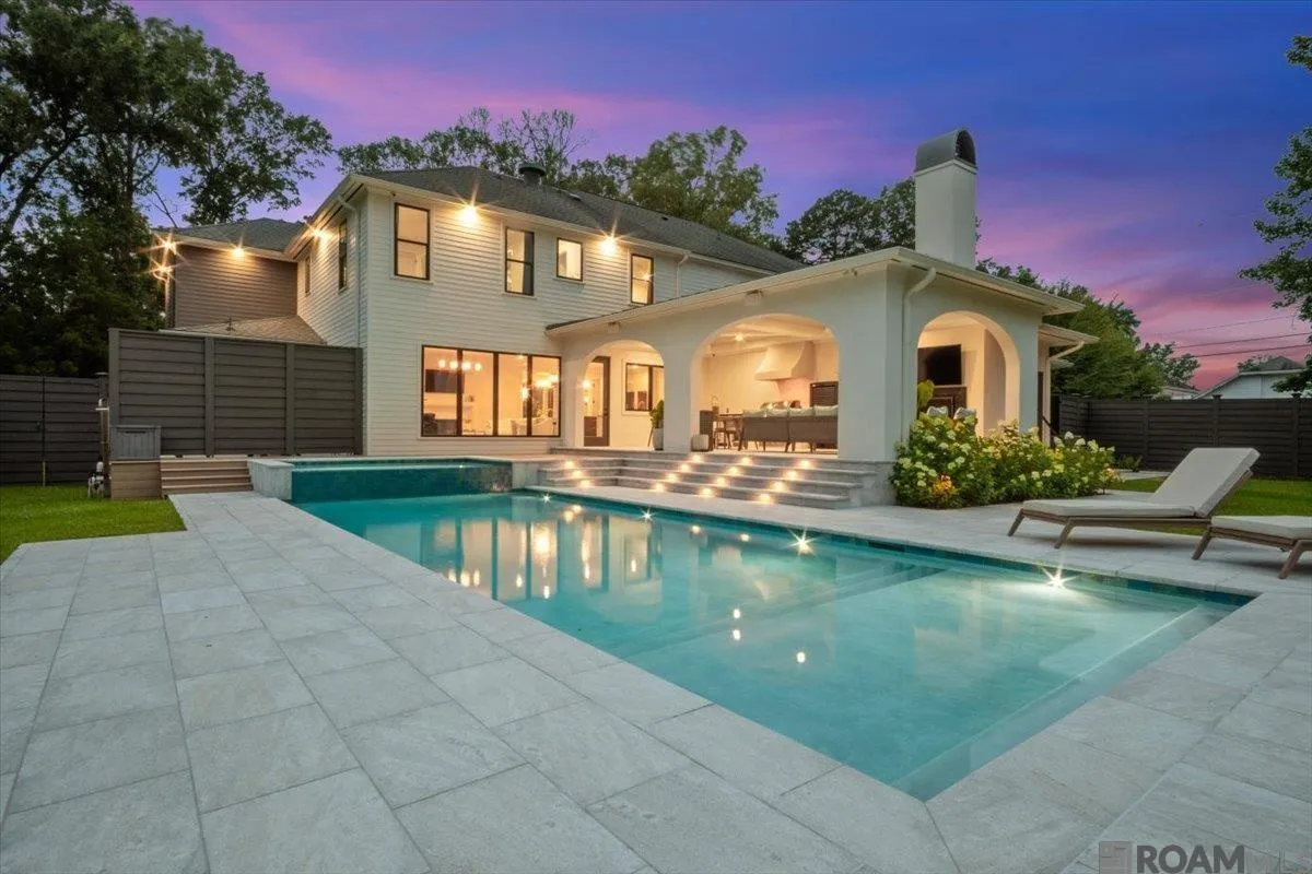 Outdoor Living at twilight beside the pool